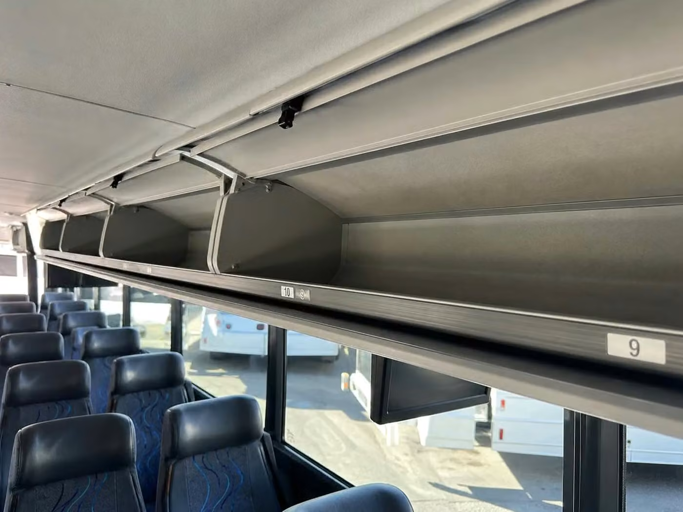 lewiston 25 passenger minibus overhead storage