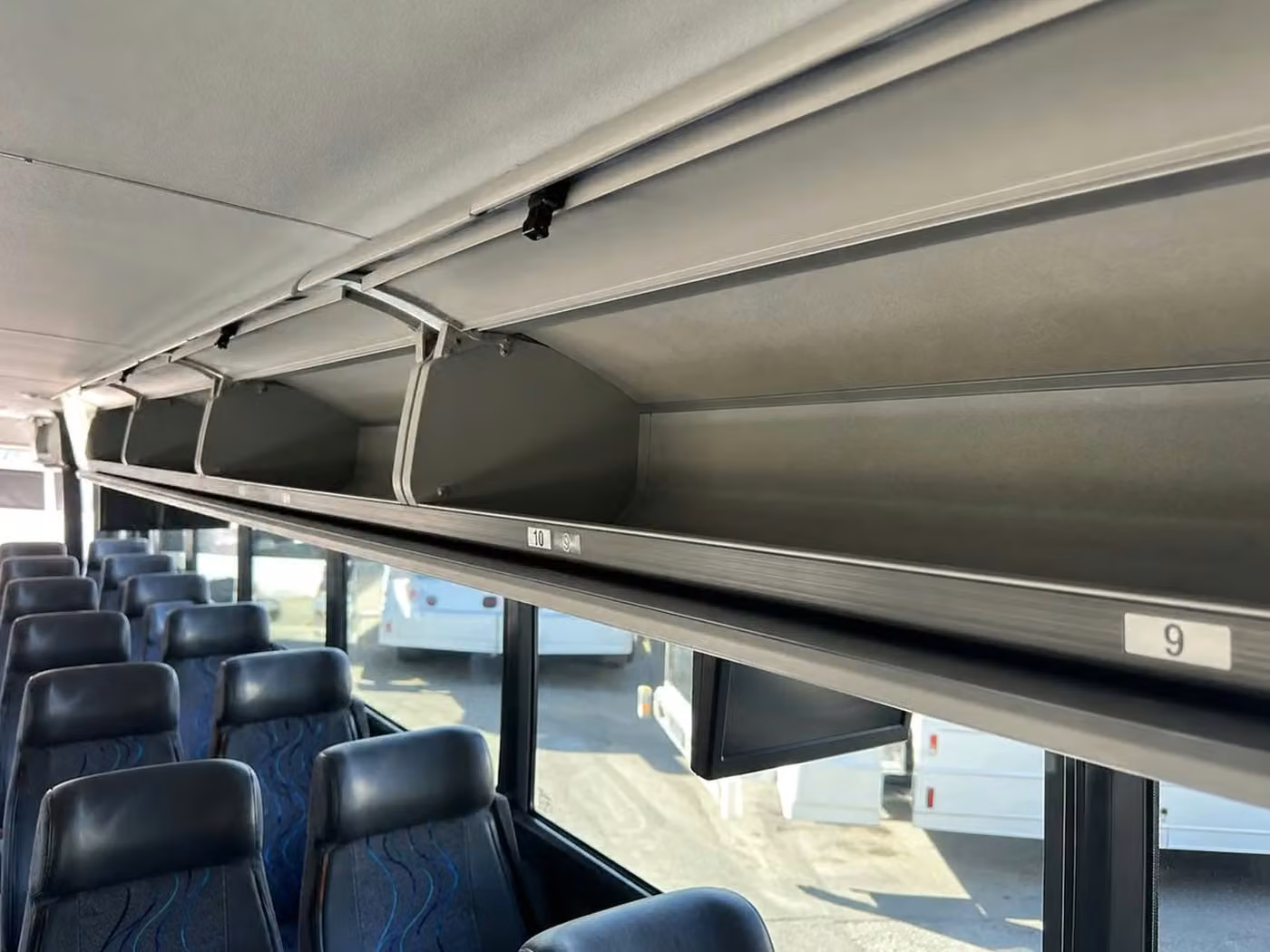 lewiston 28 passenger minibus overhead storage